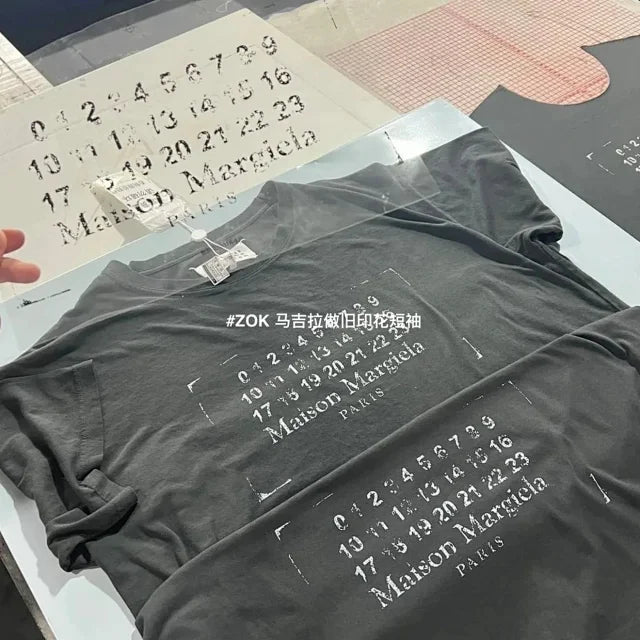 zok 공장 / 메종마르지엘라 남성 반팔 티셔츠