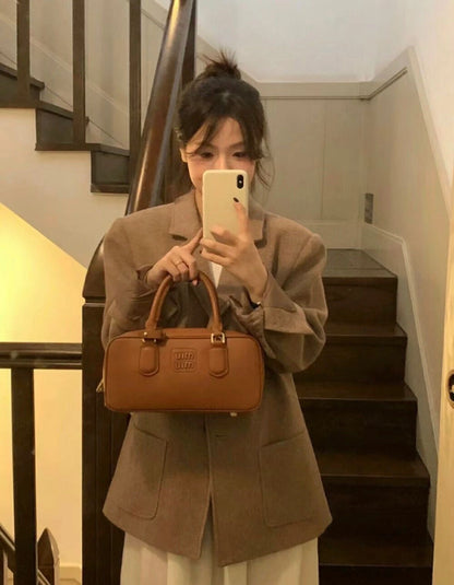 양 공장 / 미우미우 라지 블랙 볼링백