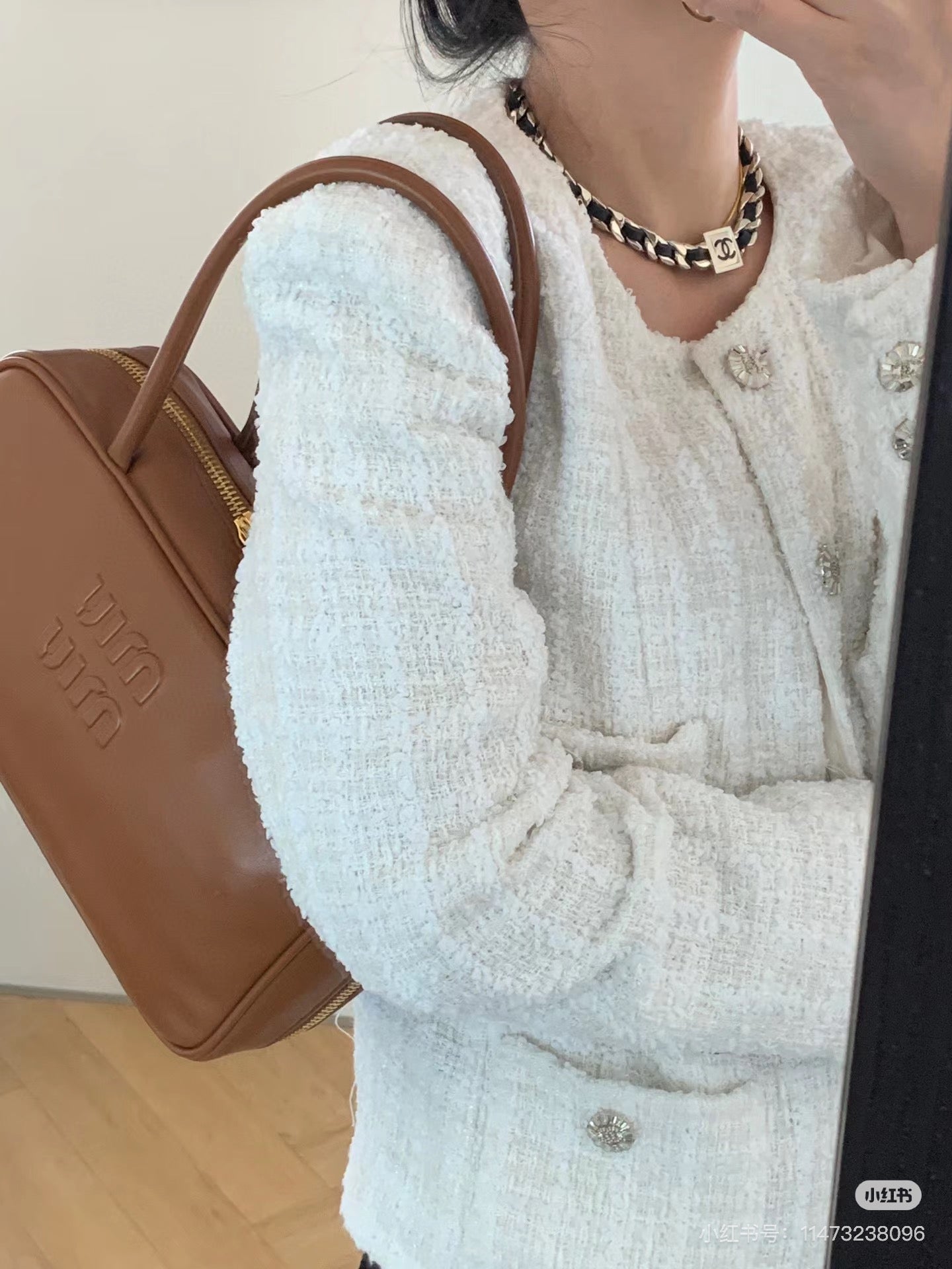 양 공장 / 미우미우 긴 손잡이가 달린 가죽 서류가방